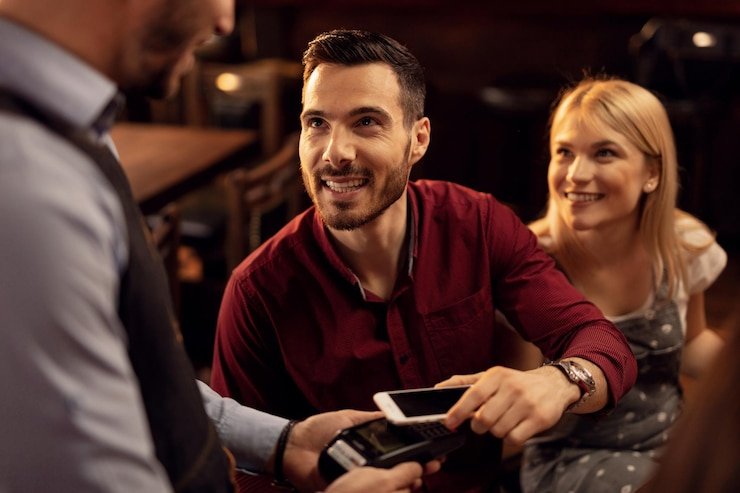 Mobile app user placing a sports bet on 1144 app interface